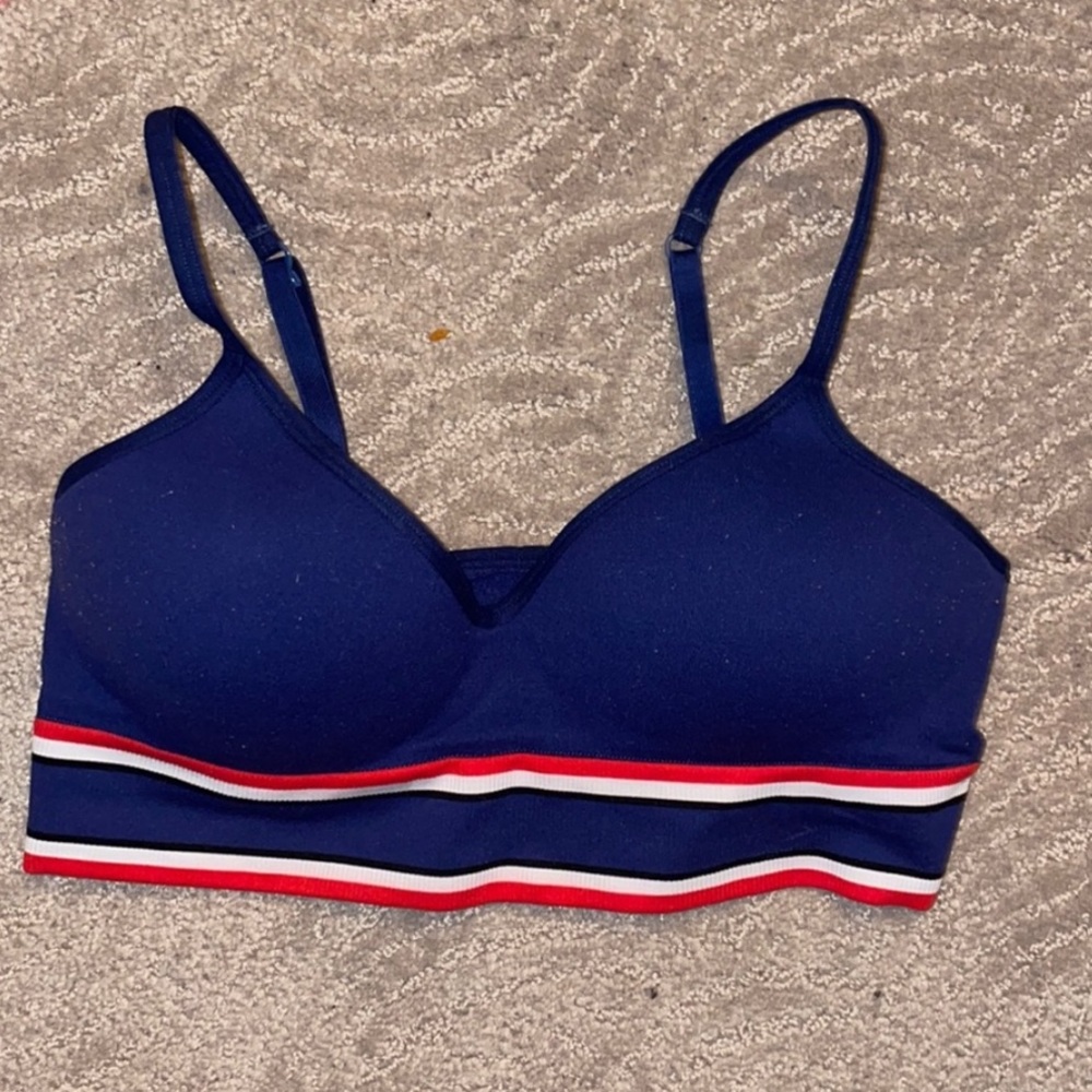Red white and blue VS pink sports bra